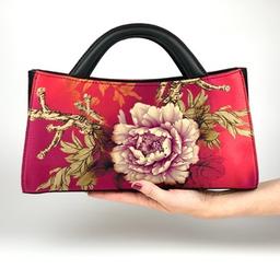 Bombyx bags and scarves: silk, textile, leather